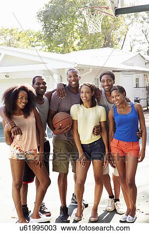 Group Of Young Friends Playing Basketball Match View Large Photo Image Stock Image - Group Of Young Friends Playing Basketball Match. Fotosearch