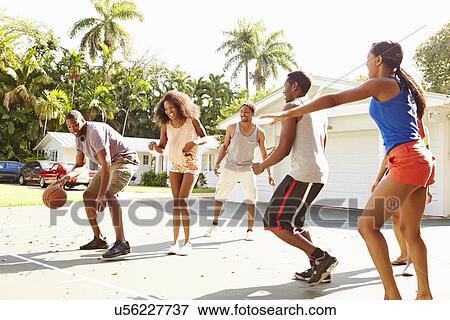 Group Of Young Friends Playing Basketball Match View Large Photo Image Stock Photo - Group Of Young Friends Playing Basketball Match. Fotosearch