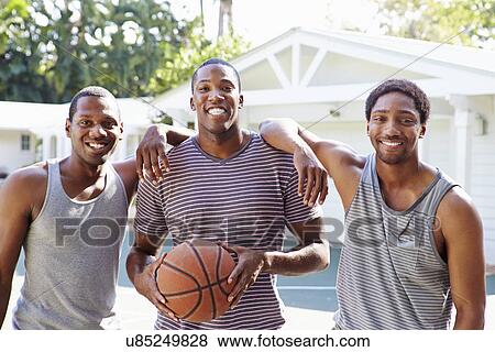 Group Of Young Men Playing Basketball Match View Large Photo Image Stock Photo - Group Of Young Men Playing Basketball Match. Fotosearch