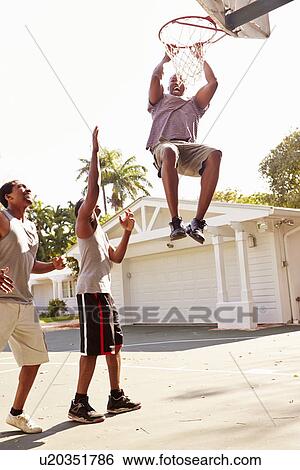 Group Of Young Men Playing Basketball Match View Large Photo Image Stock Photograph - Group Of Young Men Playing Basketball Match. Fotosearch