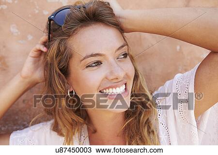Head And Shoulders Portrait Of Pretty Woman Against Wall View Large Photo Image Stock Image - Head And Shoulders Portrait Of Pretty Woman Against Wall. Fotosearch