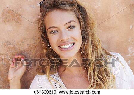Head And Shoulders Portrait Of Pretty Woman Against Wall View Large Photo Image Stock Photo - Head And Shoulders Portrait Of Pretty Woman Against Wall. Fotosearch