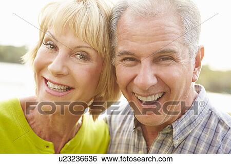 Head And Shoulders Portrait Of Senior Couple Outdoors View Large Photo Image Stock Photograph - Head And Shoulders Portrait Of Senior Couple Outdoors. Fotosearch