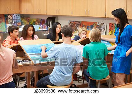 Stock Photo - High School Art Class With Teacher. Fotosearch