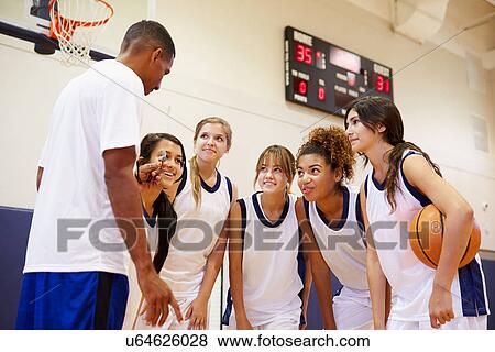 High School Basketball Team Having Team Talk With Coach View Large Photo Image Stock Photo - High School Basketball Team Having Team Talk With Coach. Fotosearch