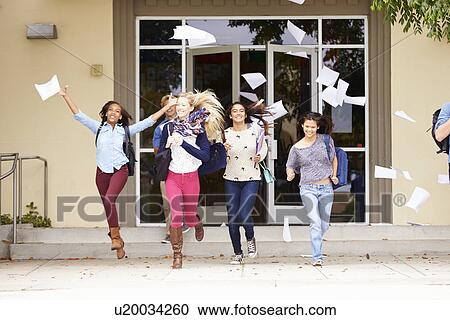 Stock Image - High School Pupils Celebrating End Of Term. Fotosearch