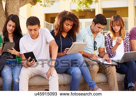 High School Students Collaborating On Project On Campus View Large Photo Image Stock Image - High School Students Collaborating On Project On Campus. Fotosearch