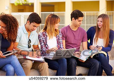 High School Students Collaborating On Project On Campus View Large Photo Image Stock Photo - High School Students Collaborating On Project On Campus. Fotosearch