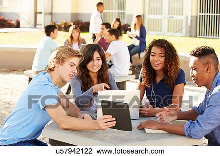 High School Students Hanging Out On Campus View Large Photo Image Stock Image - High School Students Hanging Out On Campus . Fotosearch
