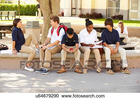 High School Students Hanging Out On School Campus View Large Photo Image Stock Image - High School Students Hanging Out On School Campus . Fotosearch