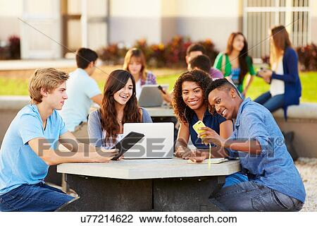High School Students Hanging Out On Campus View Large Photo Image Stock Image - High School Students Hanging Out On Campus . Fotosearch