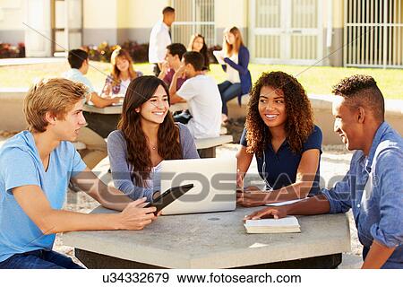 High School Students Hanging Out On Campus View Large Photo Image Stock Photo - High School Students Hanging Out On Campus . Fotosearch