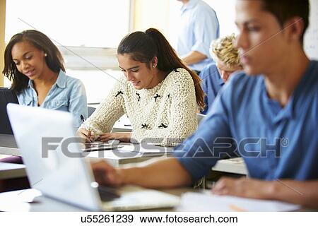 Stock Photo - High School Students In Class Using Laptops. Fotosearch