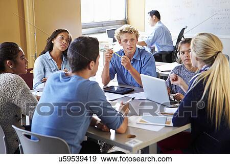 Stock Photo - High School Students In Class Using Laptops. Fotosearch