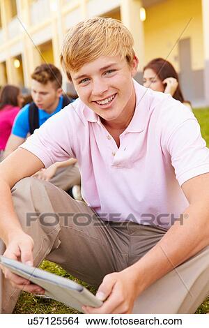 High School Students Studying Outdoors On Campus View Large Photo Image Picture - High School Students Studying Outdoors On Campus. Fotosearch