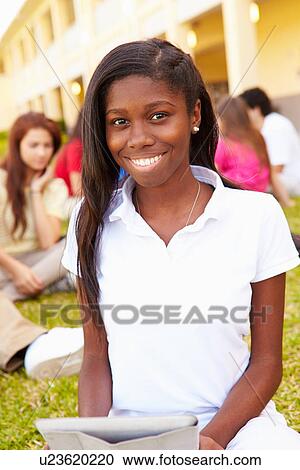 High School Students Studying Outdoors On Campus View Large Photo Image Stock Image - High School Students Studying Outdoors On Campus. Fotosearch
