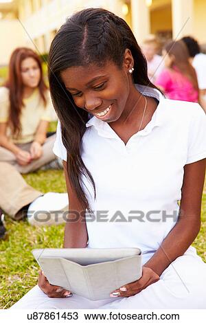 High School Students Studying Outdoors On Campus View Large Photo Image Stock Image - High School Students Studying Outdoors On Campus. Fotosearch
