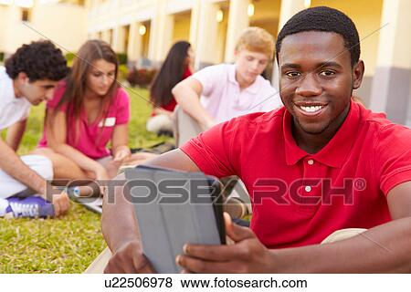 High School Students Studying Outdoors On Campus View Large Photo Image Stock Photo - High School Students Studying Outdoors On Campus. Fotosearch