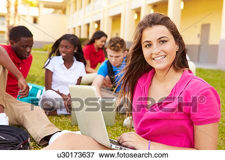 High School Students Studying Outdoors On Campus View Large Photo Image Stock Photo - High School Students Studying Outdoors On Campus. Fotosearch
