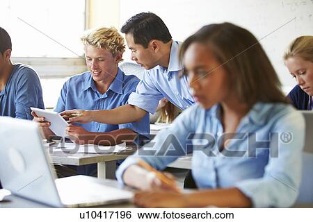 High School Students With Laptops And Digital Tablets View Large Photo Image Stock Photograph - High School Students With Laptops And Digital Tablets. Fotosearch