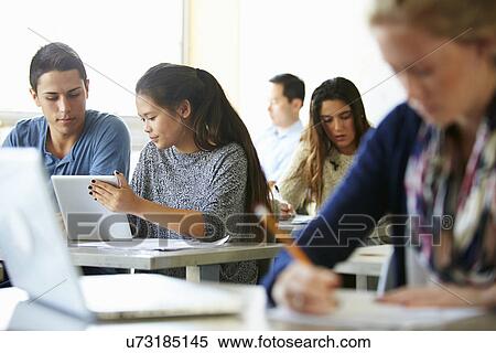 Stock Photography - High School Students With Laptops And Digital Tablets. Fotosearch
