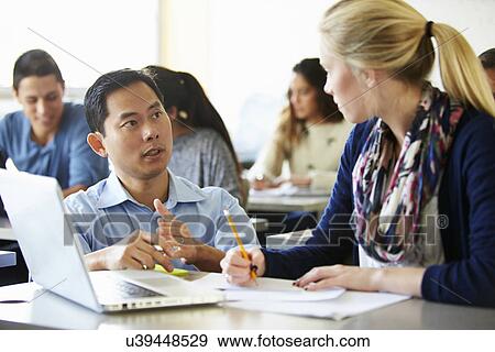 High School Students With Teacher In Class Using Laptops View Large Photo Image Stock Photo - High School Students With Teacher In Class Using Laptops. Fotosearch