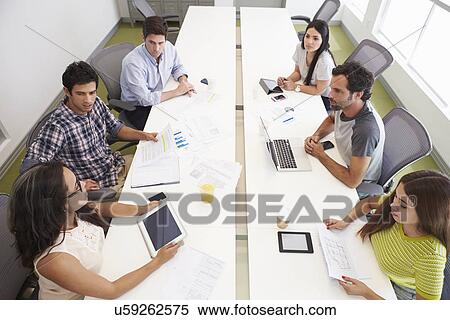 Hispanic Designers Meeting To Discuss New Ideas View Large Photo Image Stock Photography - Hispanic Designers Meeting To Discuss New Ideas. Fotosearch