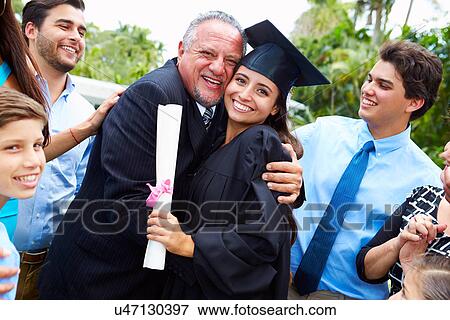 Hispanic Student And Family Celebrating Graduation View Large Photo Image Stock Photo - Hispanic Student And Family Celebrating Graduation. Fotosearch