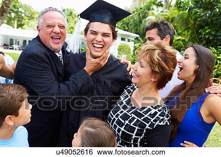 Hispanic Student And Family Celebrating Graduation View Large Photo Image Stock Photograph - Hispanic Student And Family Celebrating Graduation. Fotosearch