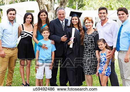 Hispanic Student And Family Celebrating Graduation View Large Photo Image Stock Photograph - Hispanic Student And Family Celebrating Graduation. Fotosearch