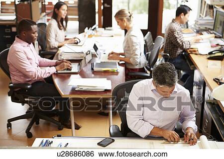 Interior Of Busy Architect's Office With Staff Working View Large Photo Image Stock Photograph - Interior Of Busy Architect's Office With Staff Working. Fotosearch