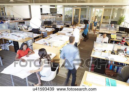 Interior Of Busy Modern Open Plan Office View Large Photo Image Stock Photo - Interior Of Busy Modern Open Plan Office. Fotosearch