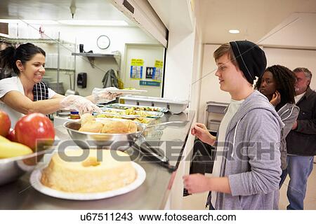 Kitchen Serving Food In Homeless Shelter View Large Photo Image Stock Image - Kitchen Serving Food In Homeless Shelter. Fotosearch