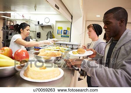 Kitchen Serving Food In Homeless Shelter View Large Photo Image Stock Image - Kitchen Serving Food In Homeless Shelter. Fotosearch