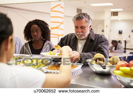 Kitchen Serving Food In Homeless Shelter View Large Photo Image Stock Image - Kitchen Serving Food In Homeless Shelter. Fotosearch