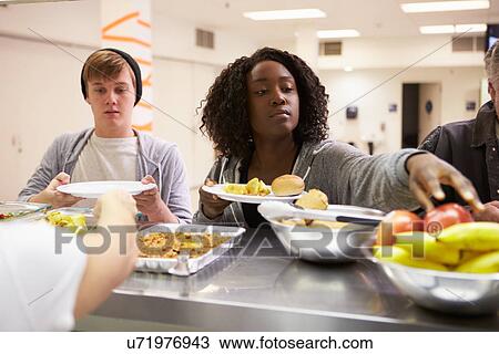 Kitchen Serving Food In Homeless Shelter View Large Photo Image Stock Image - Kitchen Serving Food In Homeless Shelter. Fotosearch