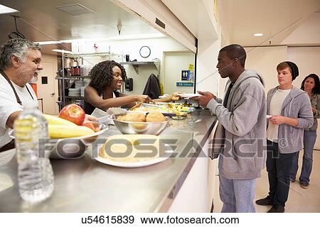 Kitchen Serving Food In Homeless Shelter View Large Photo Image Stock Photo - Kitchen Serving Food In Homeless Shelter. Fotosearch