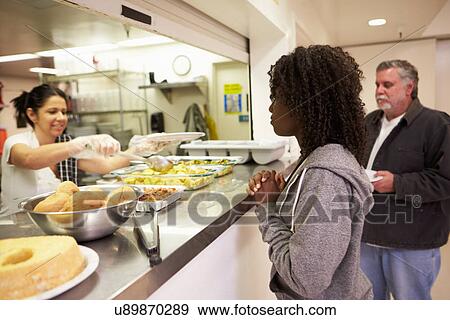Kitchen Serving Food In Homeless Shelter View Large Photo Image Stock Photo - Kitchen Serving Food In Homeless Shelter. Fotosearch
