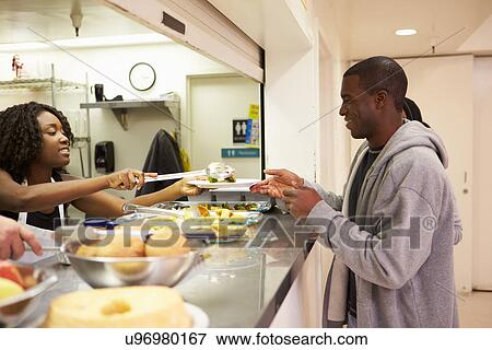 Kitchen Serving Food In Homeless Shelter View Large Photo Image Stock Photo - Kitchen Serving Food In Homeless Shelter. Fotosearch