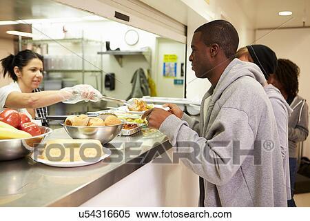 Kitchen Serving Food In Homeless Shelter View Large Photo Image Stock Photography - Kitchen Serving Food In Homeless Shelter. Fotosearch