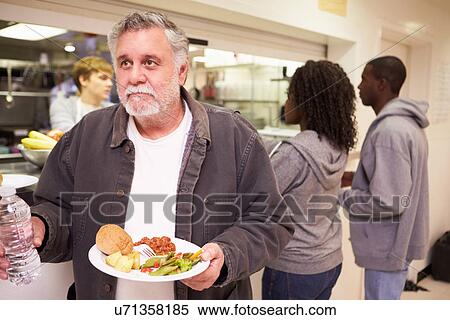Kitchen Serving Food In Homeless Shelter View Large Photo Image Stock Photography - Kitchen Serving Food In Homeless Shelter. Fotosearch