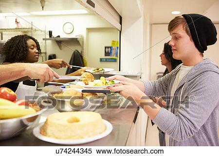 Kitchen Serving Food In Homeless Shelter View Large Photo Image Stock Photography - Kitchen Serving Food In Homeless Shelter. Fotosearch