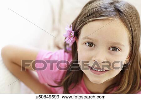 Stock Photo - Little girl at home. Fotosearch