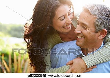 Loving Hispanic Couple In Countryside View Large Photo Image Stock Photography - Loving Hispanic Couple In Countryside. Fotosearch