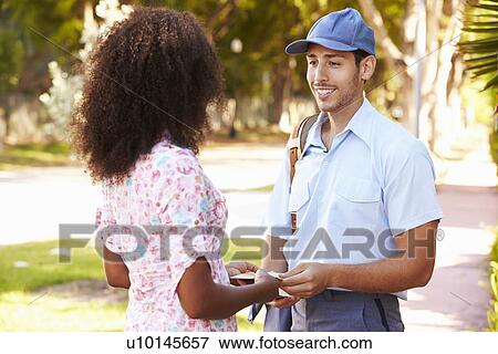 Mailman Delivering Letters To Woman View Large Photo Image Stock Photo - Mailman Delivering Letters To Woman. Fotosearch
