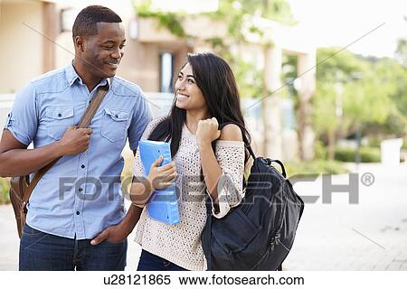 Male And Female University Students Outdoors On Campus View Large Photo Image Stock Photography - Male And Female University Students Outdoors On Campus. Fotosearch