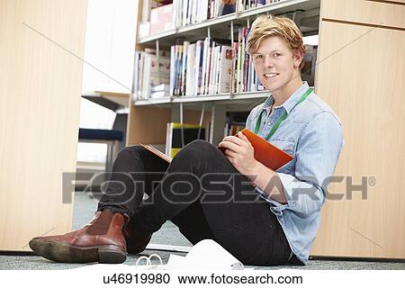 Male College Student Studying In Library View Large Photo Image Stock Image - Male College Student Studying In Library. Fotosearch