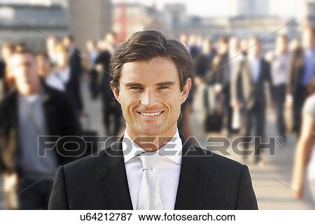 Stock Photo - Male commuter in crowd. Fotosearch