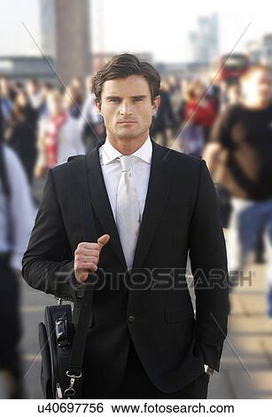 Male commuter in crowd View Large Photo Image Stock Photograph - Male commuter in crowd. Fotosearch
