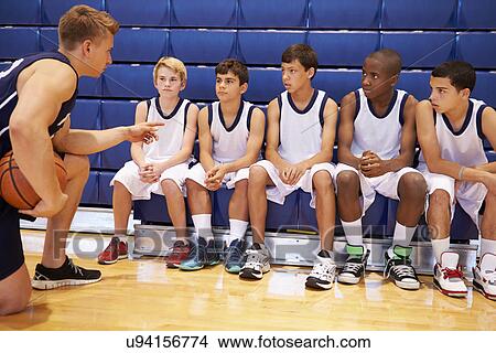Male High School Basketball Team Having Team Talk With Coach View Large Photo Image Picture - Male High School Basketball Team Having Team Talk With Coach. Fotosearch